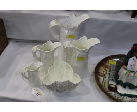 Four Royal Worcester fern leaf pattern jugs and Worcester shell shaped dish