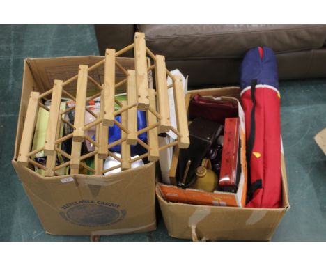 Two boxes of bottle rack, storage jars, vintage tin, lamp etc