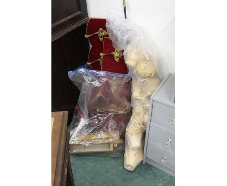 Bag of gold coloured lamp shades and coat hooks