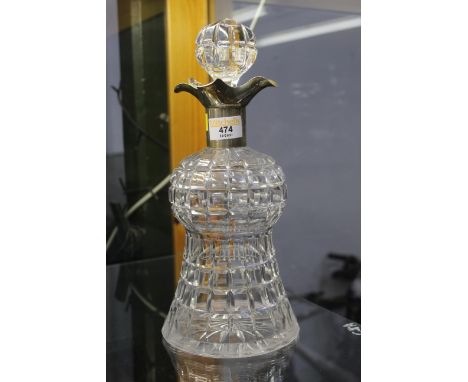 Bell shaped crystal decanter with silver collar