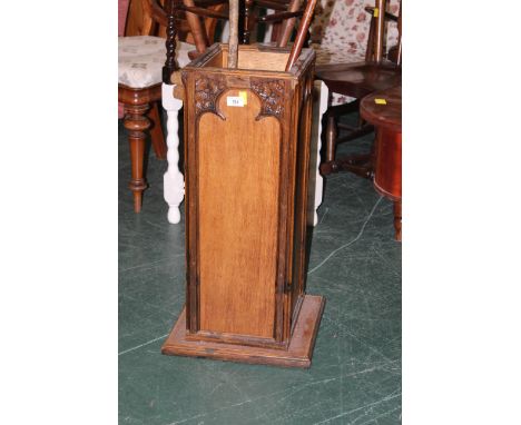 Early 20th century oak stick stand in ecclesiastical style