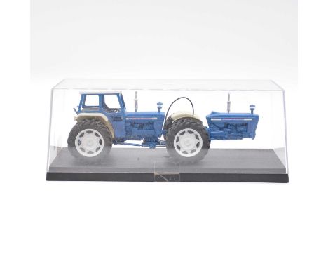 Custom built/modified die-cast model tractor, Ford 5000, with Britains mud guards, cased.