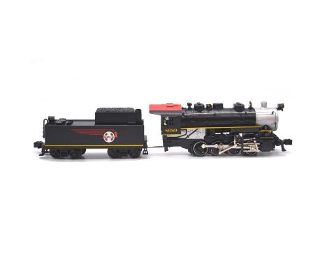 Lionel Lines O gauge model railway electric locomotive with tender, Santa Fe Flyer Freight 0-8-0, no.8689.