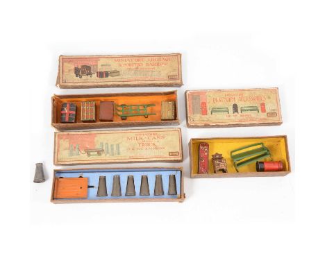 Hornby O gauge accessories sets, three including miniature platform accessories; milk cans with truck; luggage &amp; porter's