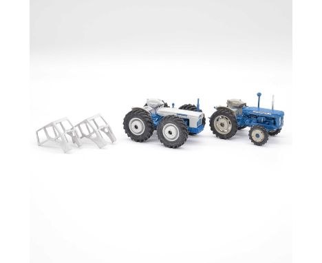 Custom made white-metal models, two including County Super Six tractor; Ploughmaster 6 tractor, both 1:32 scale, unboxed.Qty: