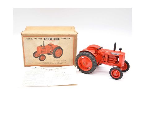 Denzil Skinner &amp; Co model Nuffield Universal tractor, 1:16 scale, red body, boxed with instructions.