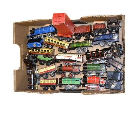 O gauge model railway clock-work locomotives and passenger coaches, one tray including Hornby, Brimtoy, and other makers. Qty