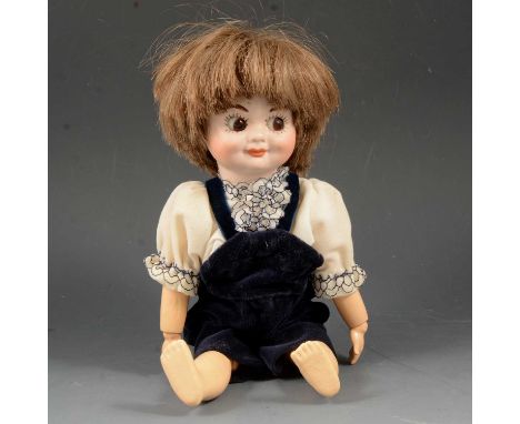 Armand Marseille bisque head googly eyed doll, head stamp 323, length 29cm.Condition report:The head has no crack or chips, l