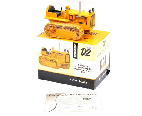 Spec cast CAT Caterpillar D2 track-type tractor, 1:16 scale, boxed with outer card box.