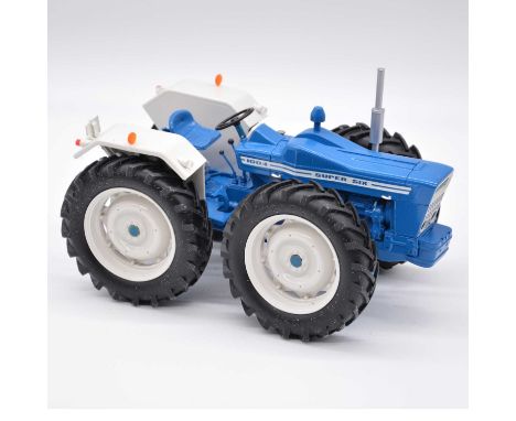 DBP Model Tractors model County 1004 Super Six tractor, 1:16 scale, blue body.