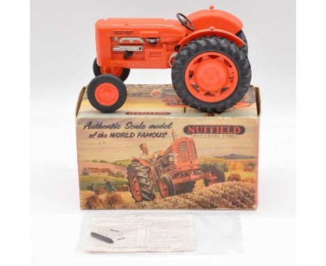 Raphael Lipkin Product model Nuffield Universal Four tractor, plastic, boxed with inner trays, instruction booklet and pipe.