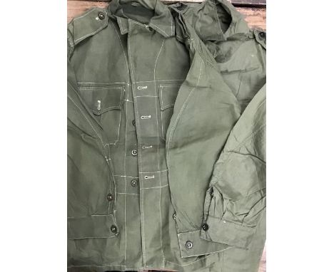 Two 1950 pattern British Army Light Weight Bush Jacket one un-worn dated 1952. (See pictures for size)
