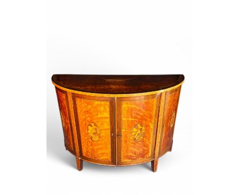 An important George III satinwood, marquetry and tulipwood banded demi-lune commode attributed to Gillows The top banded in t