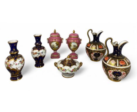 Three pieces of small Crown Staffordshire porcelain, two Crown Derby ewers and a pair of small Royal Worcester urns The pink 