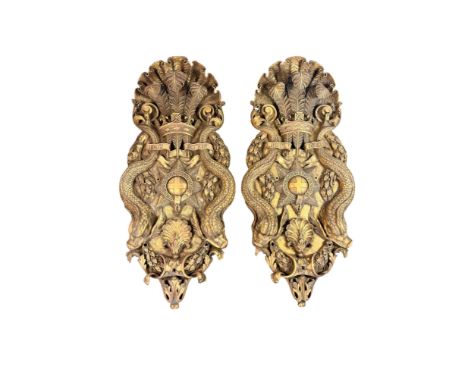 A pair of large and unusual 19th century giltwood wall carvings after a design by William Kent for the Royal Barge Of escutch