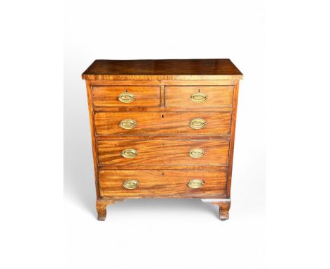 A late George III mahogany chest of drawers The rectangular top above two short and three long graduated drawers, on high sha