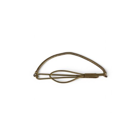 A 9ct gold tie clip with integral securing chain Birmingham marks, length 70mm, width 15mm. 7g&nbsp;Lot UpdatesAll lots are s