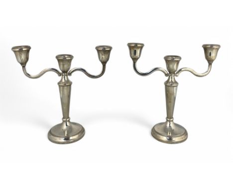 A pair of Elizabeth II silver three light candelabra, Harrison Brothers &amp; Howson Ltd., Birmingham 1988 The turned nozzles
