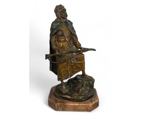 An early 20th century cold painted bronze figure of an Arab with a rifle by Argentor-Werke Rust &amp; Hetzel The standing fig