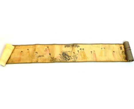 Chinese silk printed and painted scroll, the image showing women in a garden, 300 x 29cm 