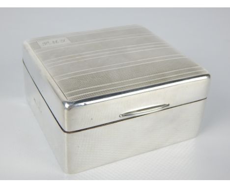 Square silver cigarette box, Birmingham date obscure, the engine turned top with ownership initials, 9cm w 