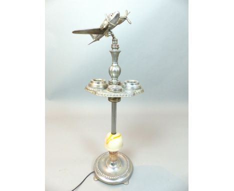 Mid 20th century American / Canadian smokers compendium table lamp, chrome plated surmounted by a twin engine aircraft incorp