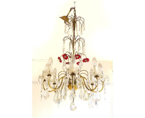 20th century gilt metal and glass eight branch chandelier, the drops incorporating red glass flowers, 90cm h
