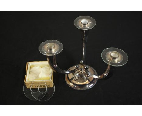 An Austrian sterling silver three branch horn design candelabra with a box of glass plates. Stamped 935, Austrian assay marks