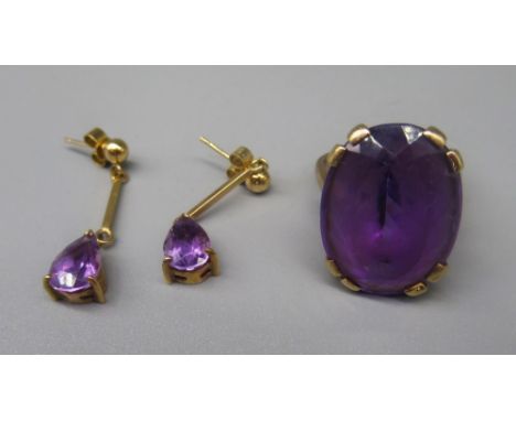 9ct yellow gold ring set with amethyst, stamped 375, O1/2, and a pair of 9ct yellow gold pear cut amethyst drop earrings, sta
