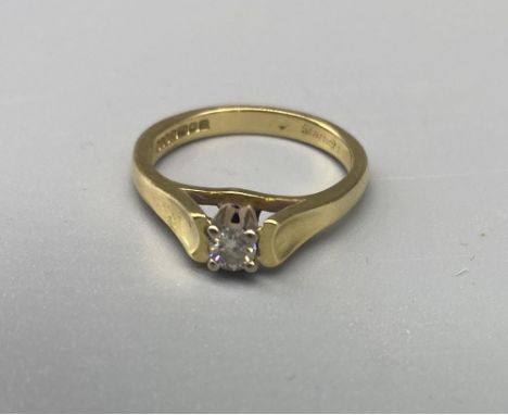 18ct yellow gold diamond solitaire ring, set with brilliant cut diamond, stamped 18, size M1/2, 4.4g 