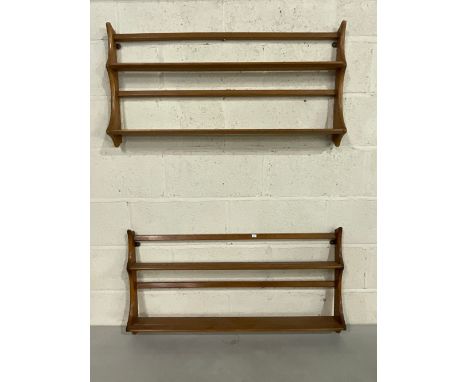 Two Ercol light two tier plate racks, one with blue label, one gold label, 97cm x 50cm (2) 