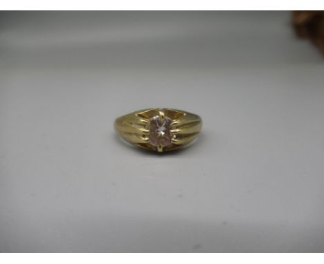 18ct yellow gold solitaire ring, the brilliant cut diamond in claw setting, on grooved shoulders and plain shank, stamped 18c