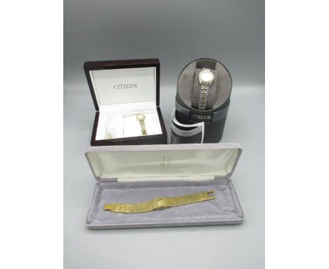 Ladies Citizen Eco-Drive WR 100 stainless steel and gold plated wristwatch with date, signed mother of pearl dial with applie