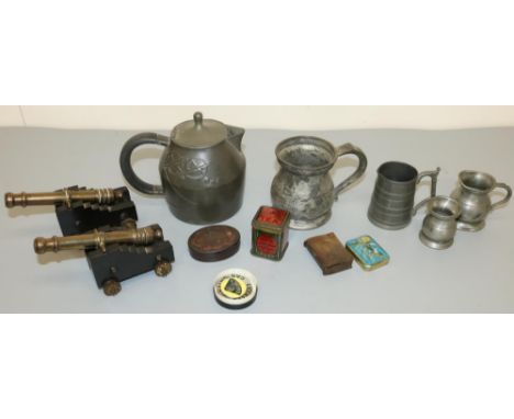 Archibald Knox four Liberty and Co Tudric pewter hot water jug with ebonised handle, impressed No 0374 the body decorated wit