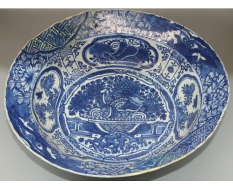 Dom Joly Collection - Chinese porcelain circular bowl, decorated in blue and white with a vases in a reserve panel in a repea