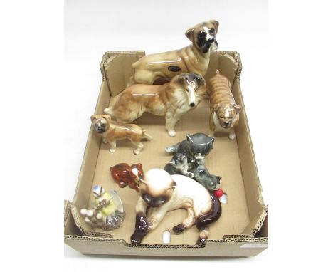 Goebel model of a seated Siamese kitten impressed No 31 027 10, Goebel Blue Tit on a branch, three Goble kittens, Goebel Bull