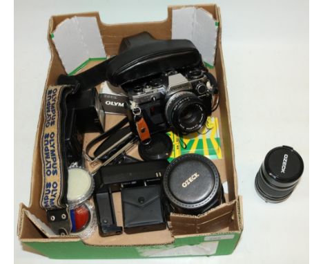 Olympus OM10 35mm camera with 1-1.850mm lens, Olympus OM Winder 2 and other accessories including lenses, filters, instructio