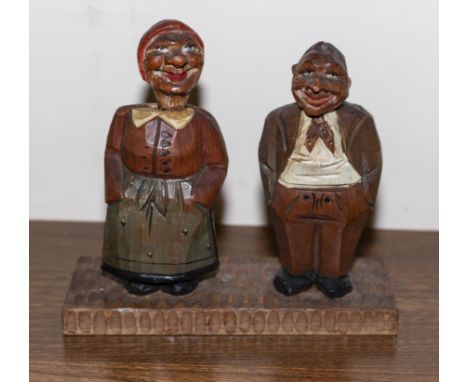 A German vintage carved wood corkscrew and bottle opener