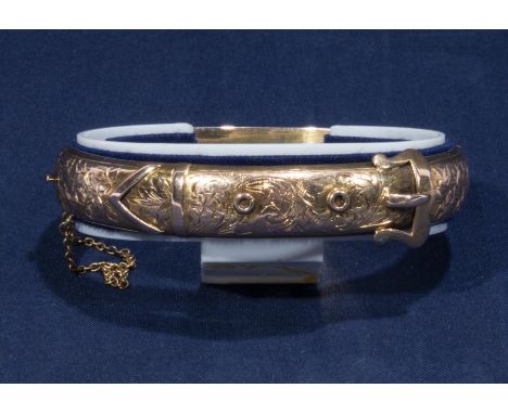 A 9ct gold bangle
