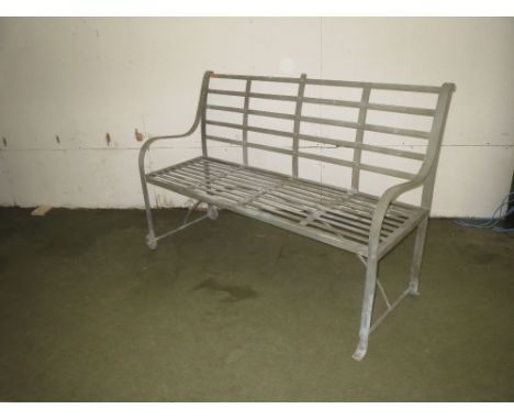 Grey painted wrought iron slatted garden bench with single end wheels