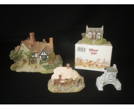 Group of 4 Liliput Lane ornaments to include Anne of Cleves, Spring Bank, Carrick House, and an Aldis projector