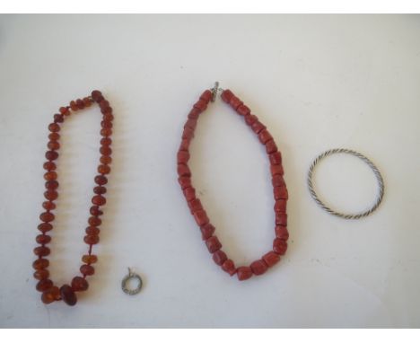White metal bangle and coral necklace and amber style necklace