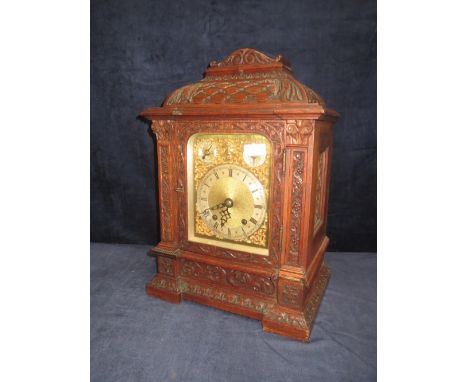 Late Victorian carved oak bracket clock, the dial with silvered chapter ring & subsidiary dials, "Fast/slow and Chime/silent.