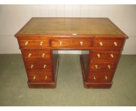 C19th mahogany pedestal desk of 9 drawers