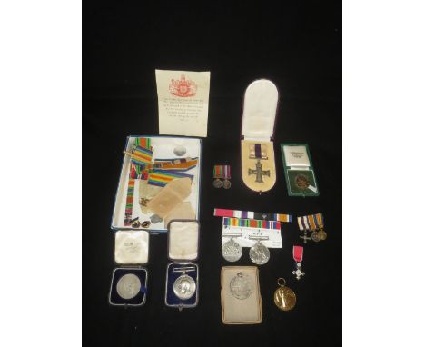 World War I three medal group comprising Military cross in case of issue, 1914-18 War medal and Victory Medal awarded to Majo