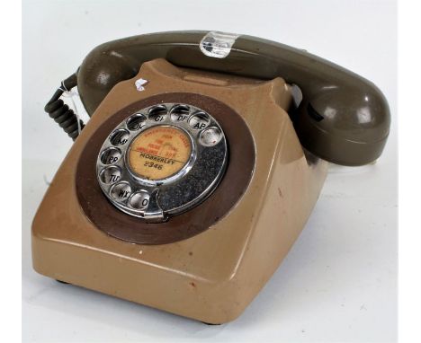 Plastic cased rotary dial telephone