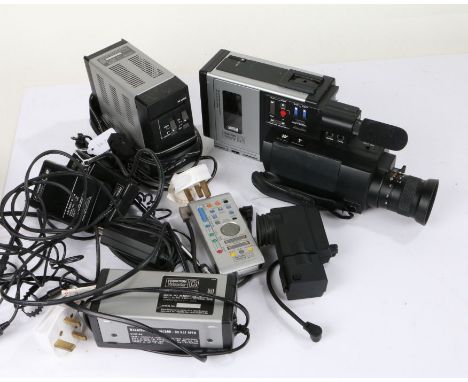 Ferguson Videostar C video recorder, with a TV zoom lens 8-48mm, and accessories to include battery packs, mains adaptor, bat