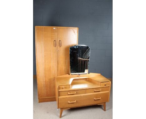G-Plan light oak bedroom suite comprising a double wardrobe, 92cm wide x 175cm high, together with a matching dressing chest,