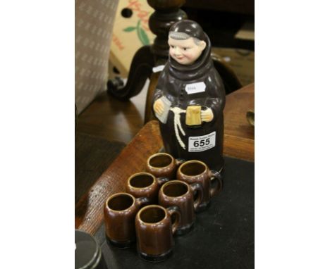 A novelty Friar spirit flask together with six mugs 