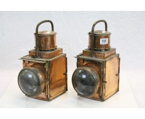 Two copper railway lanterns, BR(M) in relief to both, height approximately 33cm (2)